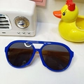 Blue round-frame children's sunglasses with UV protection and a double bridge design - Sapphire Blue