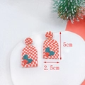 Detail view of handmade Christmas earrings with red checkered pattern and holiday motifs - Red White Checkerboard Decor