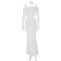 Elegant white two-piece set featuring off-shoulder long sleeve top and ruffled maxi skirt - S / White