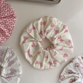 Detailed close-up of soft cotton scrunchies with floral and bow patterns in pastel colors - Light Blue Polka Dot Pink Bow