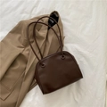 Minimalist chocolate brown shoulder tote bag with unique loop handle on khaki blazer - Dark Brown