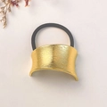 Fashionable golden metal hair tie with brushed texture and black elastic band on white background - Gold Curved Brushed Buckle