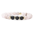 Detail of 10mm elastic bracelet with lava stone, translucent beads and gold metal accents - 8mm White Stone Black Lava Gold Bead