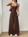 Close-up of a dark brown halter neck wide-leg jumpsuit with a waist-cinching fit - XS / Top And Bottom / Dark Brown