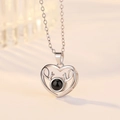 Detail of silver heart necklace with deer antlers and black projection stone pendant - Reindeer Heart White Gold Color