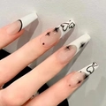 Uñas postizas largas tipo coffin con diseños de corazones negros y estrellas - Estilo de Corazón Blanco y Negro Francés - Tipo de Pegamento (Y-303)