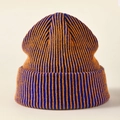 Detailed view of the thick orange and blue striped knit texture on the beanie fold - Royal Blue and Orange