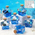 Décoration étoilée en acrylique liquide avec paquebot et sable bleu de l'océan - Porte-stylo Pentagramme - Eau Bleue