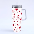 Detailed view of 40oz tumbler with red hearts and dots pattern, handle and clear straw - R167 / 40oz