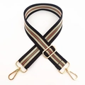 Detail of adjustable striped bag strap with gold metal hooks and durable weaving texture - Gold Buckle / Black Stripe