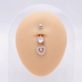 Macro detail of silver heart belly button ring with clear zircons on model skin - Silver Heart Pendant Style (JE0430A)