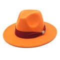 Close-up of orange wool fedora with burgundy ribbon and silver rhinestone buckle - Orange