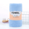Light blue coral fleece bath towel rolled up with elegant paper packaging band - 70*140cm / Blue (Wrapped)