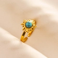 Detailed view of bohemian sun totem ring with turquoise bead and adjustable gold band - Gold-Light Blue Turquoise