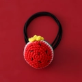 Detail of handmade crocheted watermelon hair tie with high-quality elastic rubber band - Round Watermelon