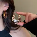 U-shaped leopard print geometric hoop earrings with vintage gold metal accents for women - Gold Brown Large Loop (62)