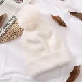 Winter knit beanie in creamy white with a large faux fur pompom and plush brim - White