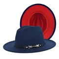 Detail of wool fedora hat with navy blue exterior, red interior, and black leather belt - Navy + Red
