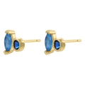 Detail of 18K gold plated stud earrings with marquise and round blue gems in bezel setting - Gold Plated Blue Zirconia