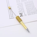 Elegante penna a sfera oro champagne con strass di cristallo e punta a sfera in metallo - Inchiostro Nero / Giallo Ambra