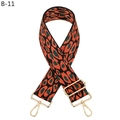 Macro shot of colorful leopard print wide strap with gold-tone adjustable metal buckles - B-11 Black & Orange Leopard