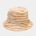 Detailed close-up of fluffy faux fur texture on a striped brown winter bucket hat - M (56-58cm) / Beige