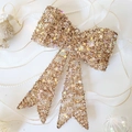 Sparkling champagne gold iron art bow ornament for Christmas tree and festive window display - Champagne Gold