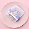 Detail of 12 rolls floral washi tape set with magic girl design in a clear plastic storage box - Girl-Purple Set