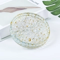 Crystal resin tray with gold foil flakes in round shape for jewelry storage - Aquamarine