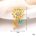 Luxury crystal sunflower brooch with yellow petals and green enamel leaf detail - D2402 Sunflower Golden Yellow