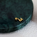 Polished gold initial M pendant with adjustable slider chain on marble base - Letter Pendant (M) / Gold