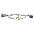 Detailed shot of infinity star charm on colorful woven bracelet with long silk tassels - Infinity Gold + Rainbow Rope with Tassels