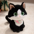 Süße schwarz-weiße Plüschkatze mit grünem Stricklatz und großen grünen Augen - Blumenstil / 35cm