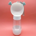 White portable pet water bottle with heart detail and carry strap on coral background - Cute Style Food Storage White