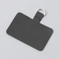 Close-up of a durable black TPU phone tether tab with a silver D-ring connector - Silver Clasp / Black