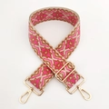 Close-up of geometric ethnic woven bag strap with golden metal swivel hooks and buckles - Gold Clasp / Brown Rose Pink Floral