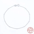 Detailed view of sterling silver bean chain bracelet with Real Sterling 925 Silver seal - White Gold