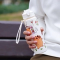 Portable white water bottle with cute cartoon capybara stickers and a carrying strap - White-TV