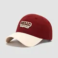 Close-up of HELLO happiness embroidery on kids color-block cotton baseball cap - 54cm (3-8 Years) / Wine Red and Beige