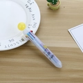 Creative 10-color shuttle ballpoint pen with yellow ball cap and crown pattern on a wooden desk - Yellow Crown Yellow Ball