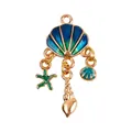 Gold-plated ocean pendant featuring shell, starfish, and snail in blue-green enamel - Shell Cluster Pendant