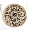 Round jute placemat with mandala print and decorative fringe on a white table - Type T Yellow Cloth Tassel