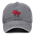 Detailed view of grey washed cotton baseball cap with red heart balloon embroidery - Adjustable / Gray