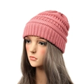 Pink knit beanie for women with elegant horizontal wavy texture on white background - Watermelon red
