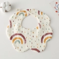 Detail of petal-shaped cotton baby bib featuring rainbow patterns and adjustable snaps - Gauze Flower Wrap - Rainbow Rainbow