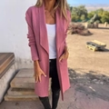 Detail shot of pink long-length knitted cardigan with textured lapel and soft knit pattern - S / Tops / Pink
