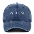 Close-up of white OK AND? embroidery on washed blue denim baseball cap - Navy Blue