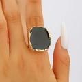 Close-up of a vintage gold alloy irregular ring with black oil drip finish on a finger - KC Gold Black (03 KC Gold Black 3185)