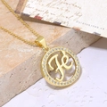 Goldene Herzanhänger-Halskette mit Zirkonia-Besatz und elegantem Kursiv-Buchstaben - Rundes Buchstabendesign