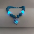 Luminous turquoise bead bracelet with glowing lotus pendant and yoga energy beads - Navy Blue Turquoise Blue Glow